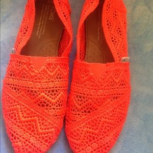 Orange toms size 7